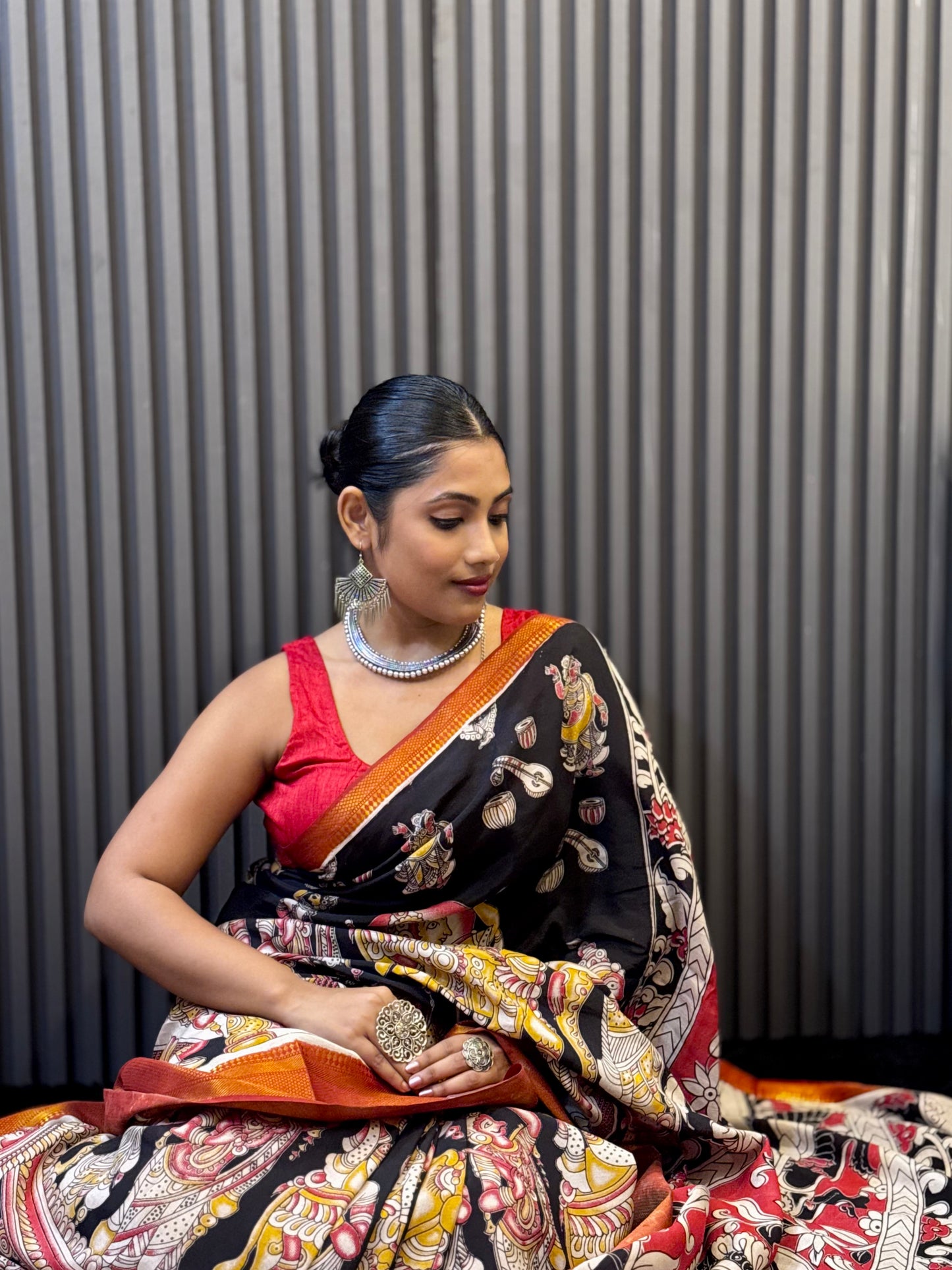 Kalika - Black Kalamkari silk saree with Deity & Peacock Motifs