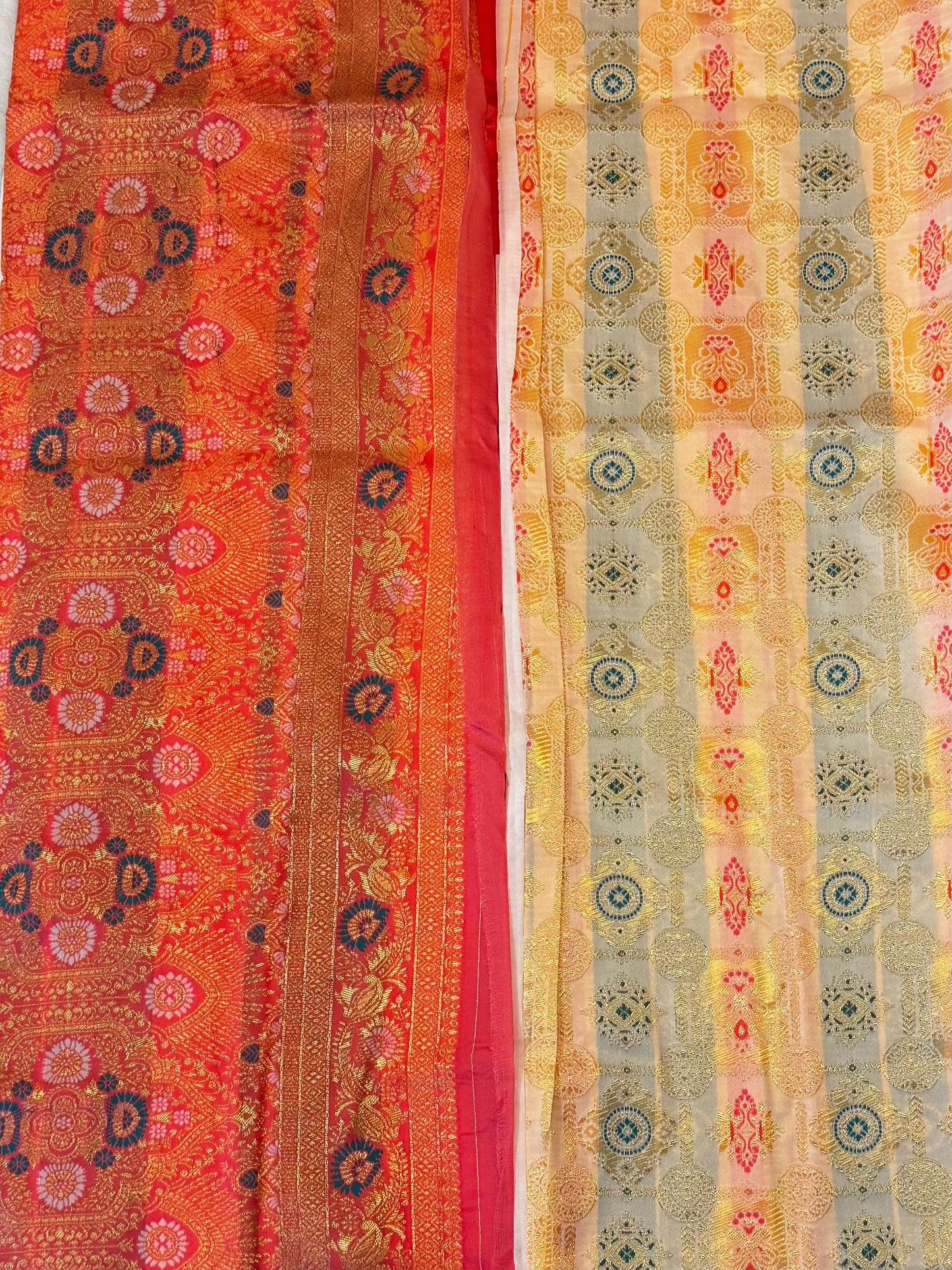 Aaradhya – A Handwoven Ivory Patola Saree with Scarlet Border and Intricate Golden Zari Work
