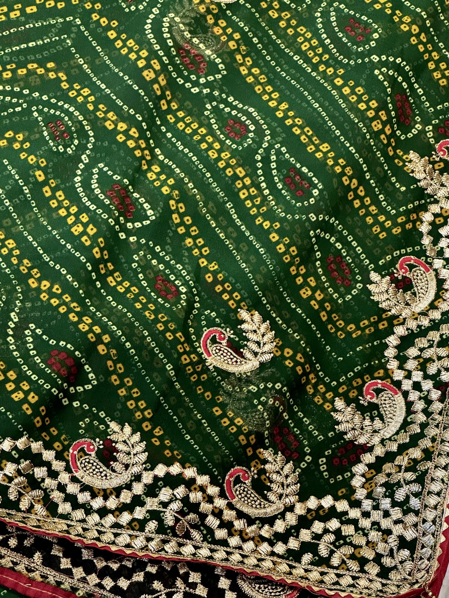 Kumkum – A Handcrafted Green Bandhani Saree with Gota Embroidery