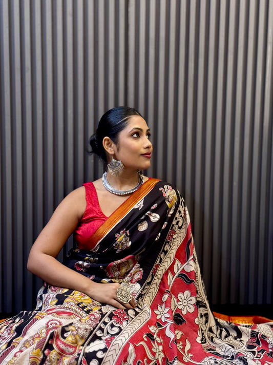 Kalika - Black Kalamkari silk saree with Deity & Peacock Motifs