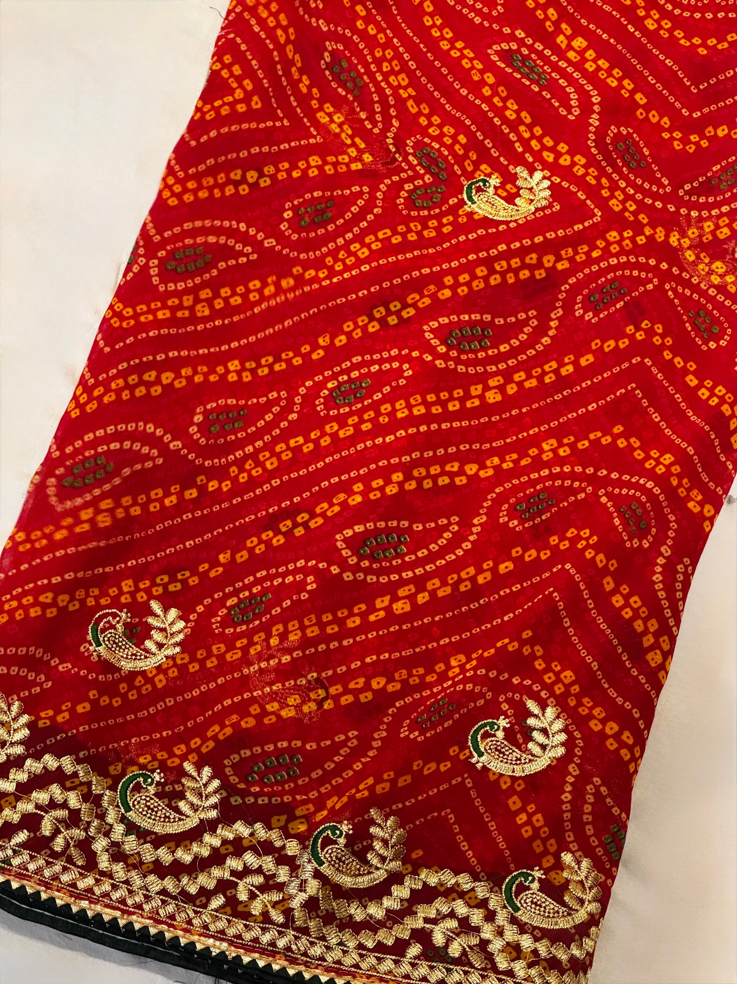 Kumkum – A Handcrafted Green Bandhani Saree with Gota Embroidery