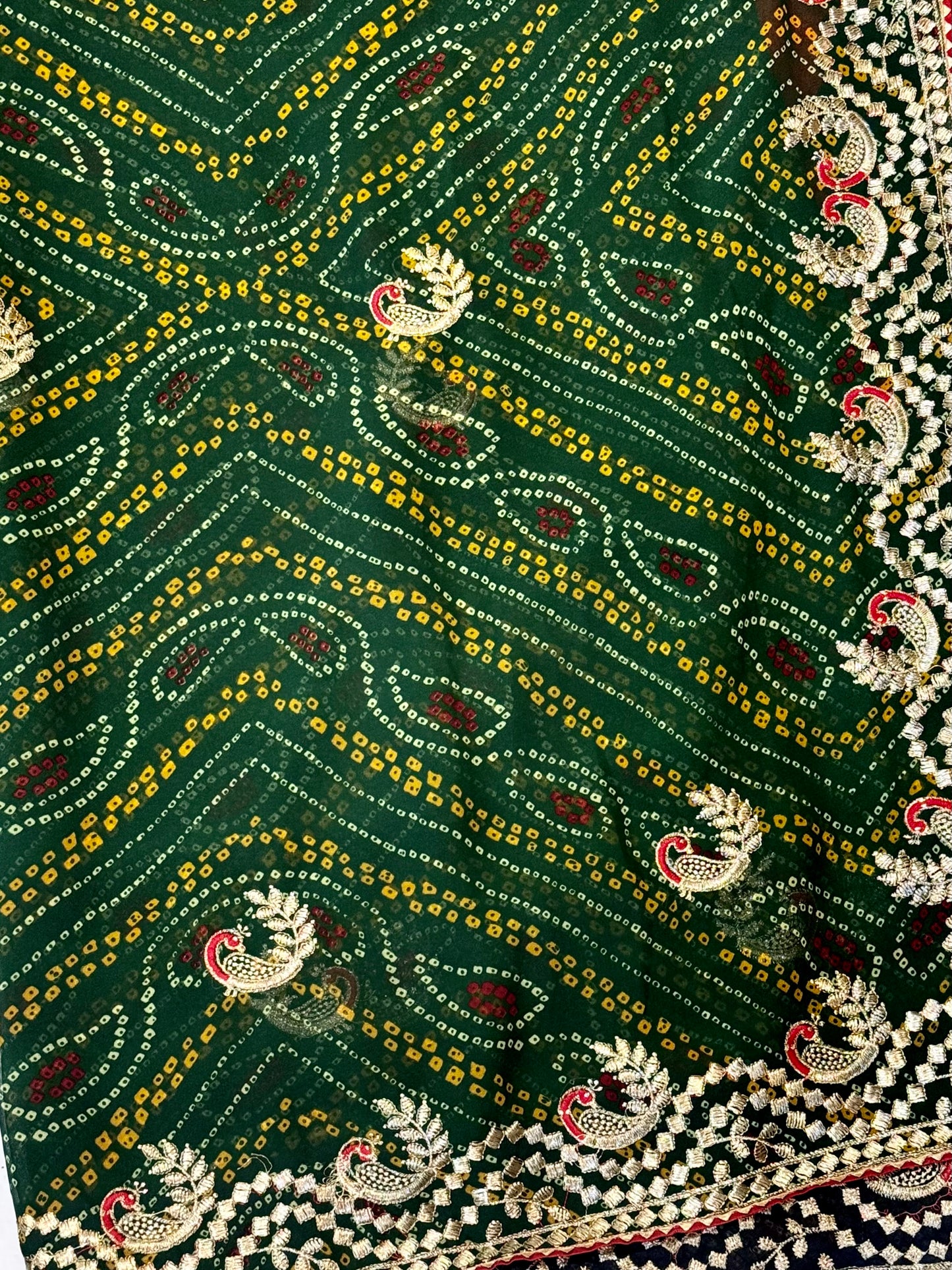 Kumkum – A Handcrafted Green Bandhani Saree with Gota Embroidery