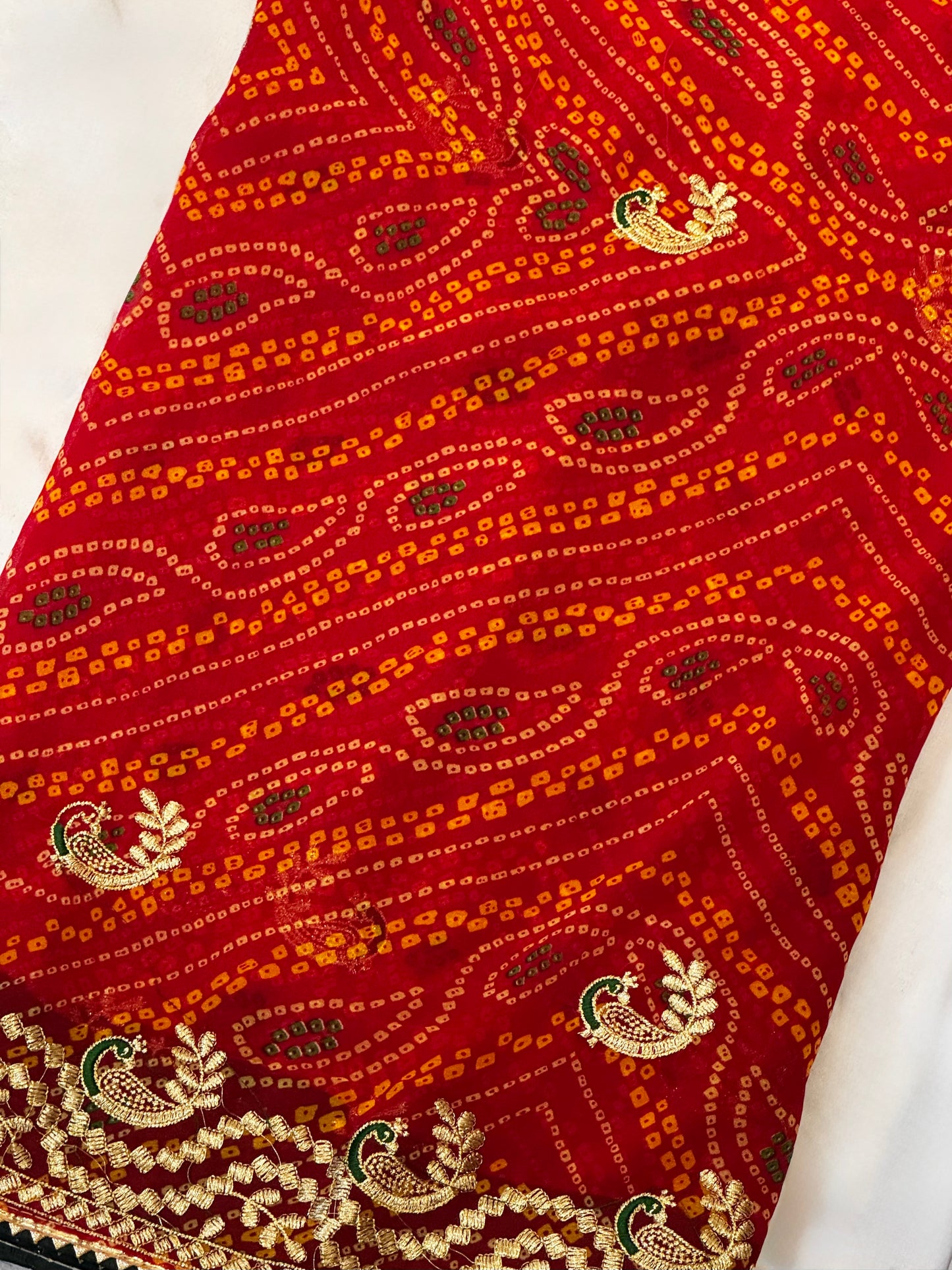 Kumkum – A Handcrafted Green Bandhani Saree with Gota Embroidery