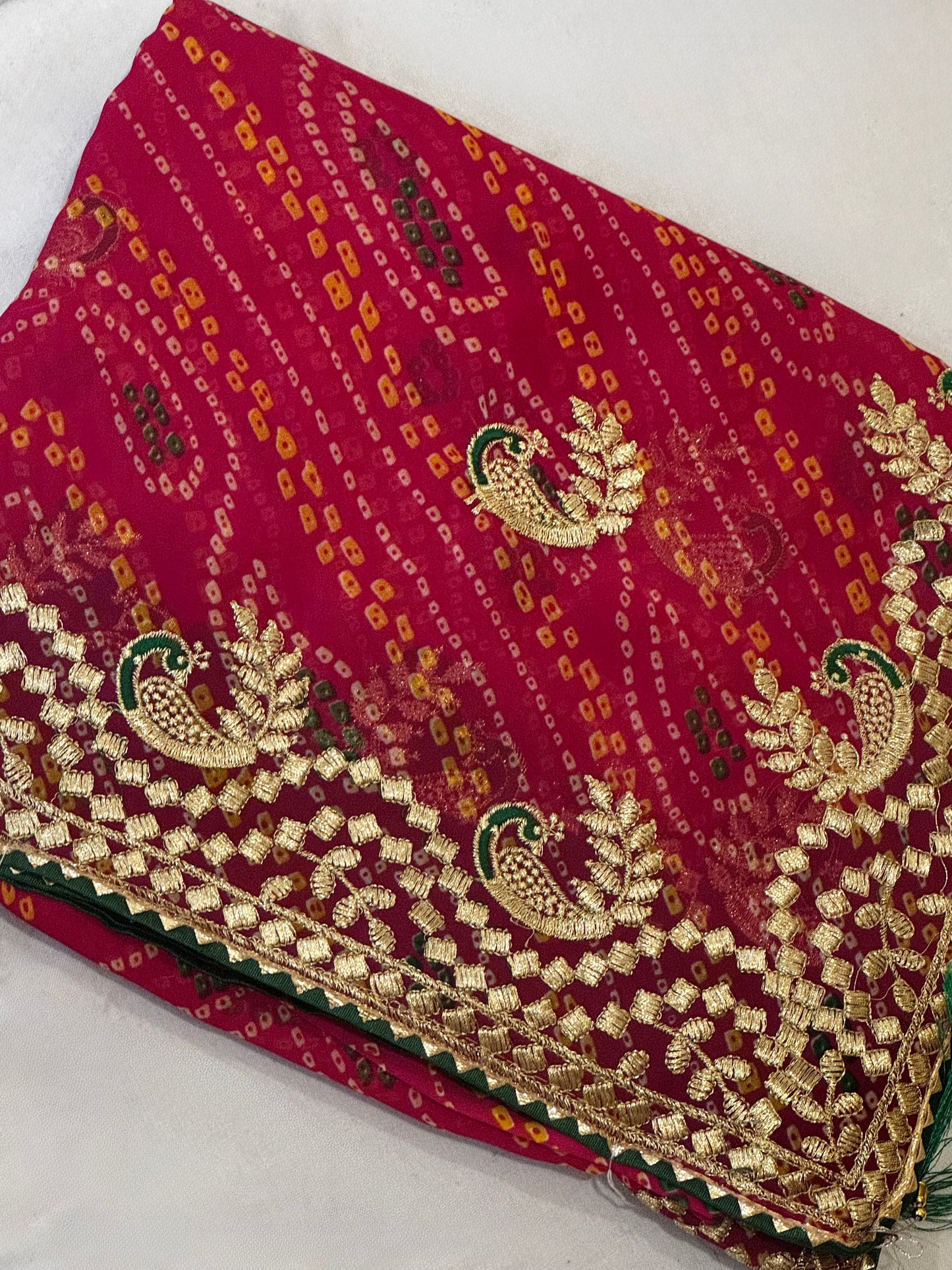 Kumkum – A Handcrafted Green Bandhani Saree with Gota Embroidery