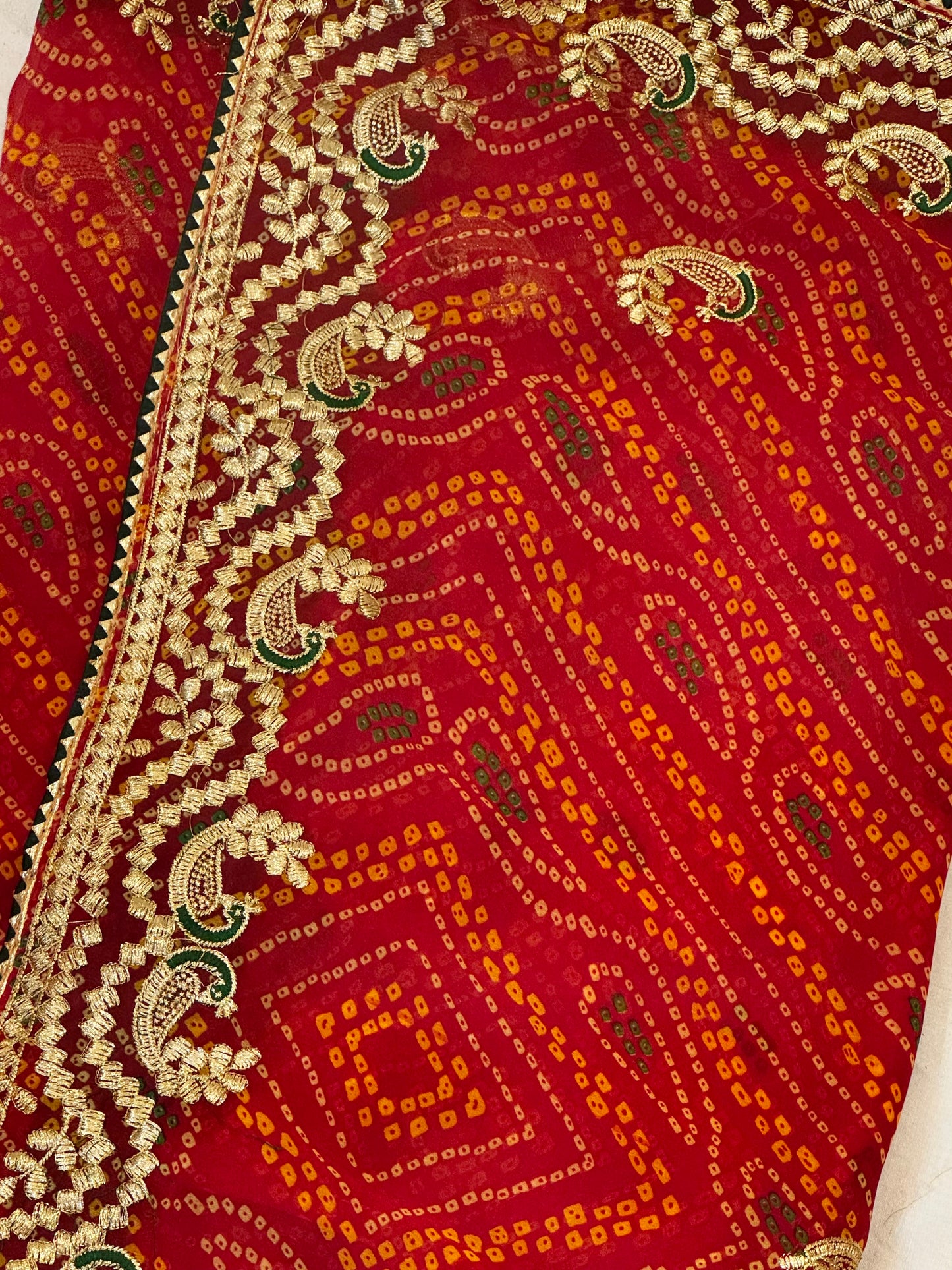 Kumkum – A Handcrafted Green Bandhani Saree with Gota Embroidery