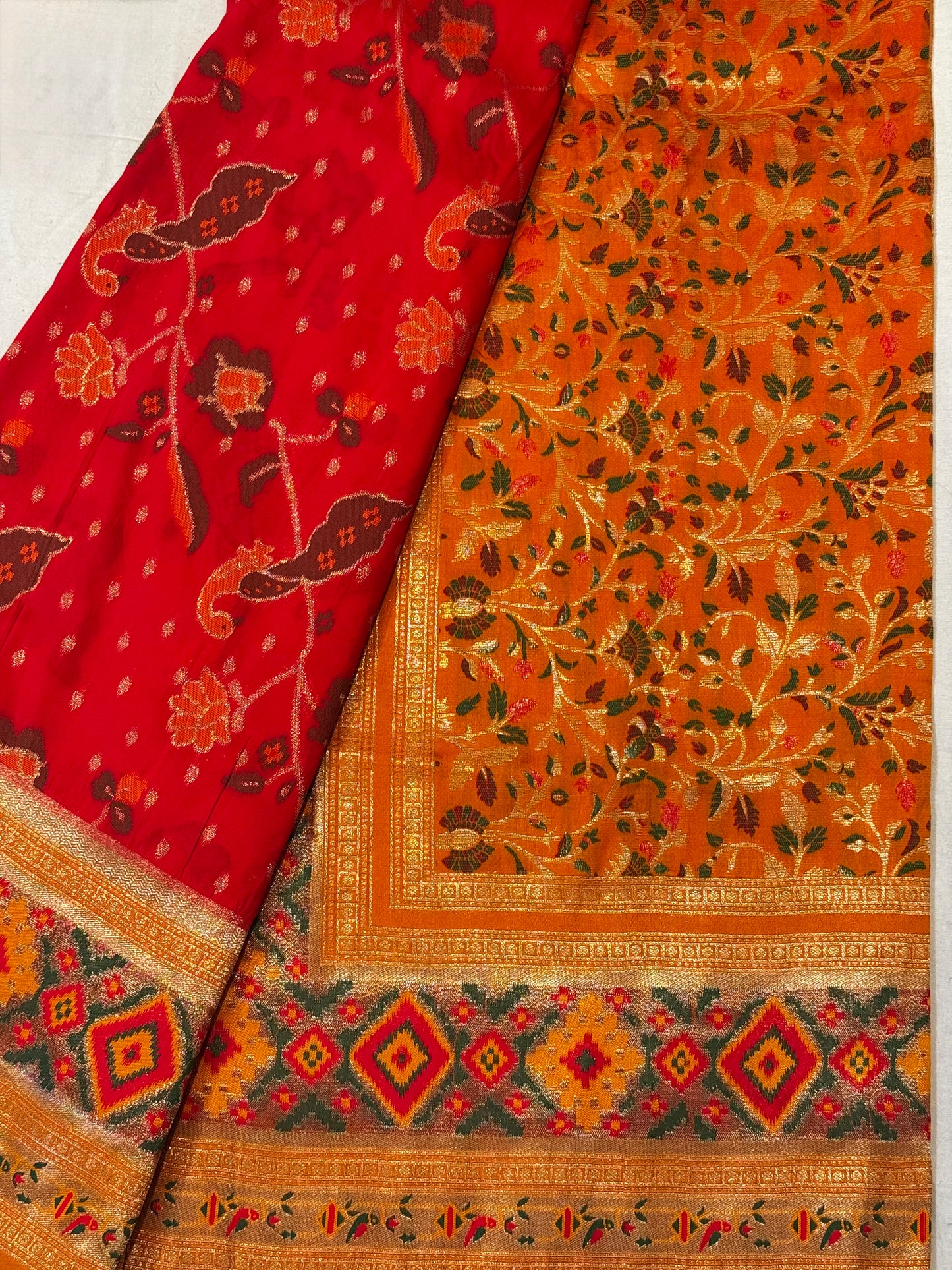 Surya – A Handwoven Pink Patola Saree with Orange Contrast and Golden Zari Detailing