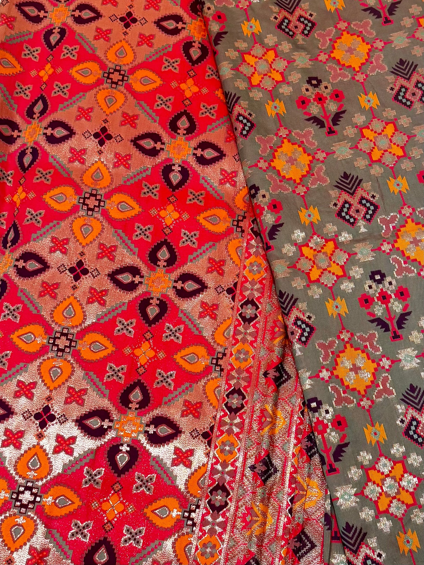 Tara – A Handwoven Green Patola Saree with Copper-Pink Border and Vibrant Ikat Motifs