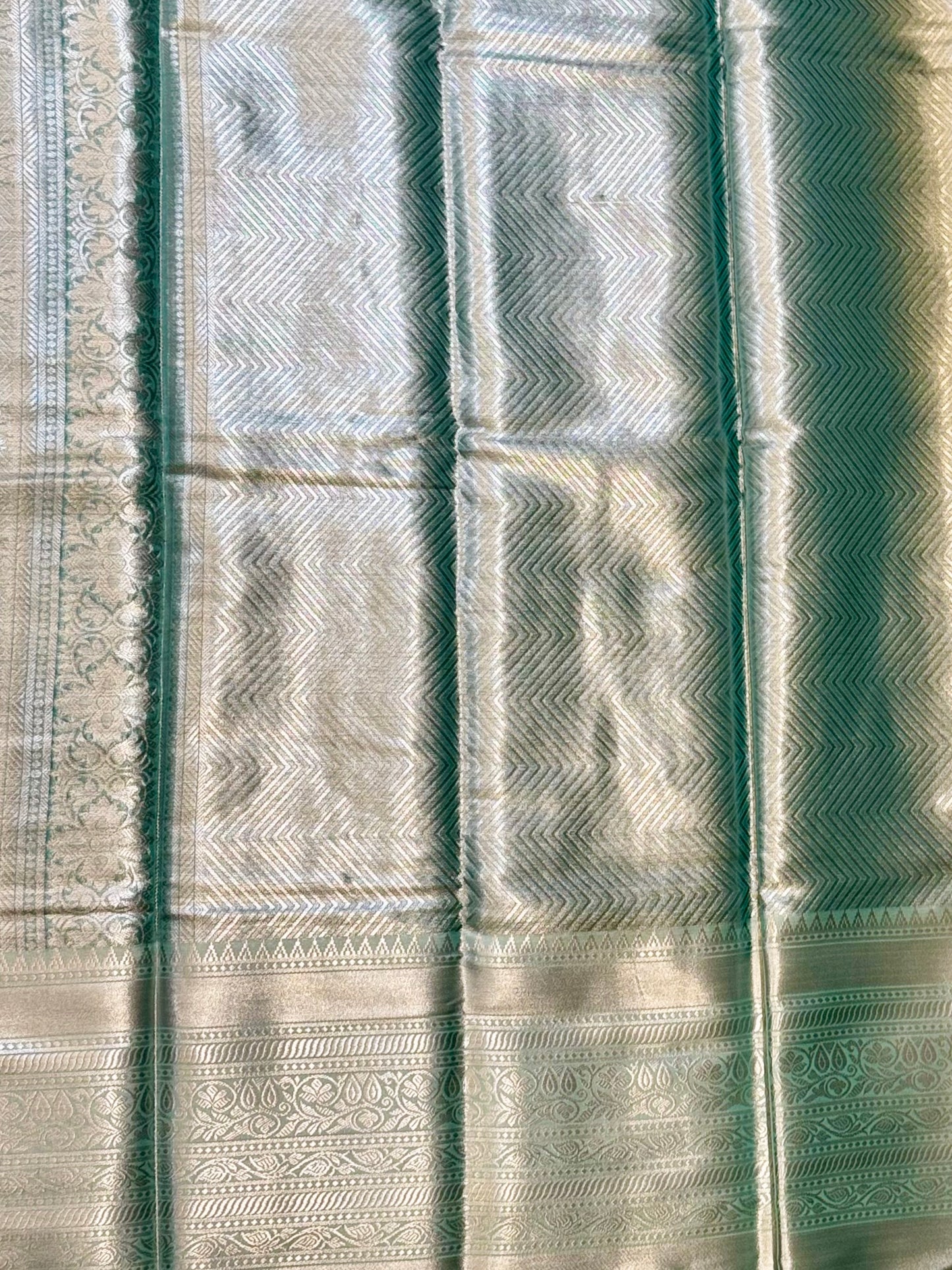 Varnika – Mint Silver Self-Woven Kanjeevaram Silk Saree with Traditional Motifs