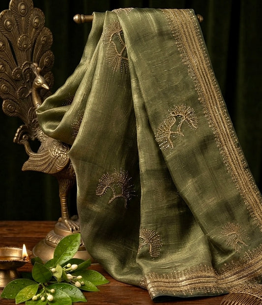 Aarushi – An Olive Green Tissue Silk Saree with Intricate Zari Embroidery