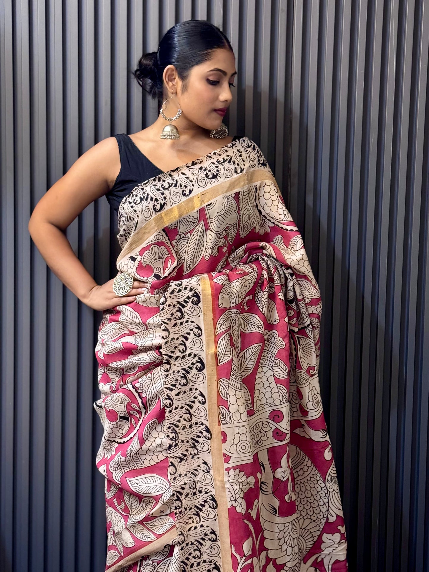 Mayurkatha - Soft Pink Kalamkari silk saree with Peacock & Fish Motifs