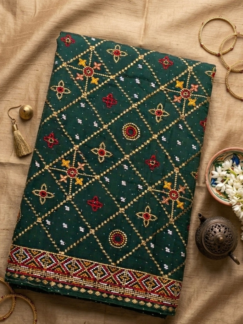 Meera – A Handcrafted Dark Green Bandhani Saree with Traditional Geometric Motifs
