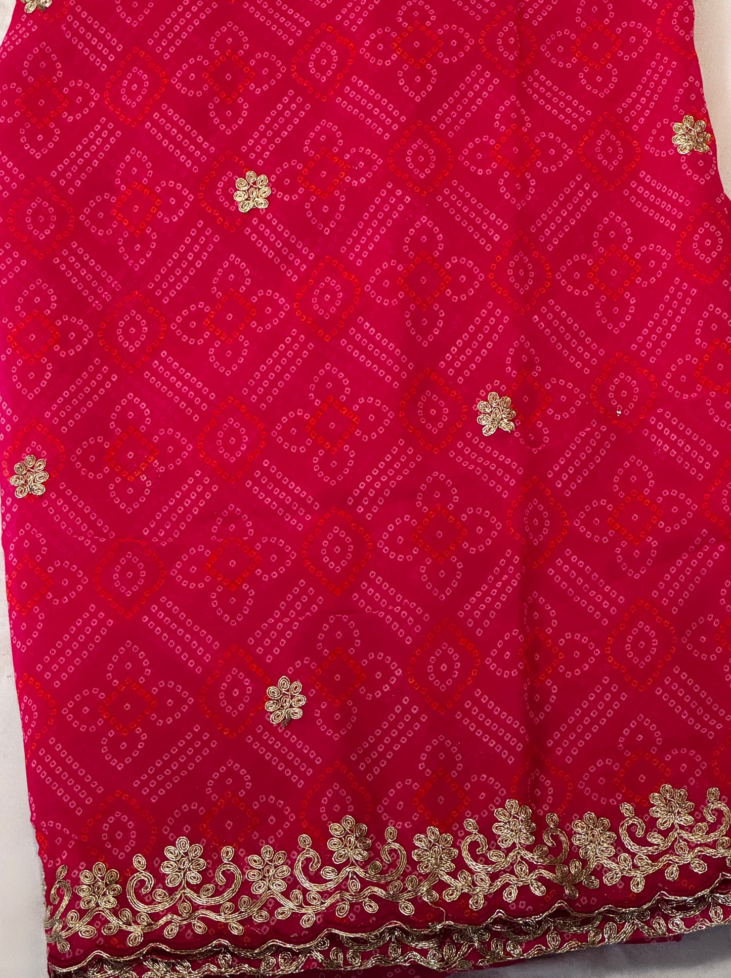 Ruhani – A Deep Pink Bandhani Saree with Gota Lace Border