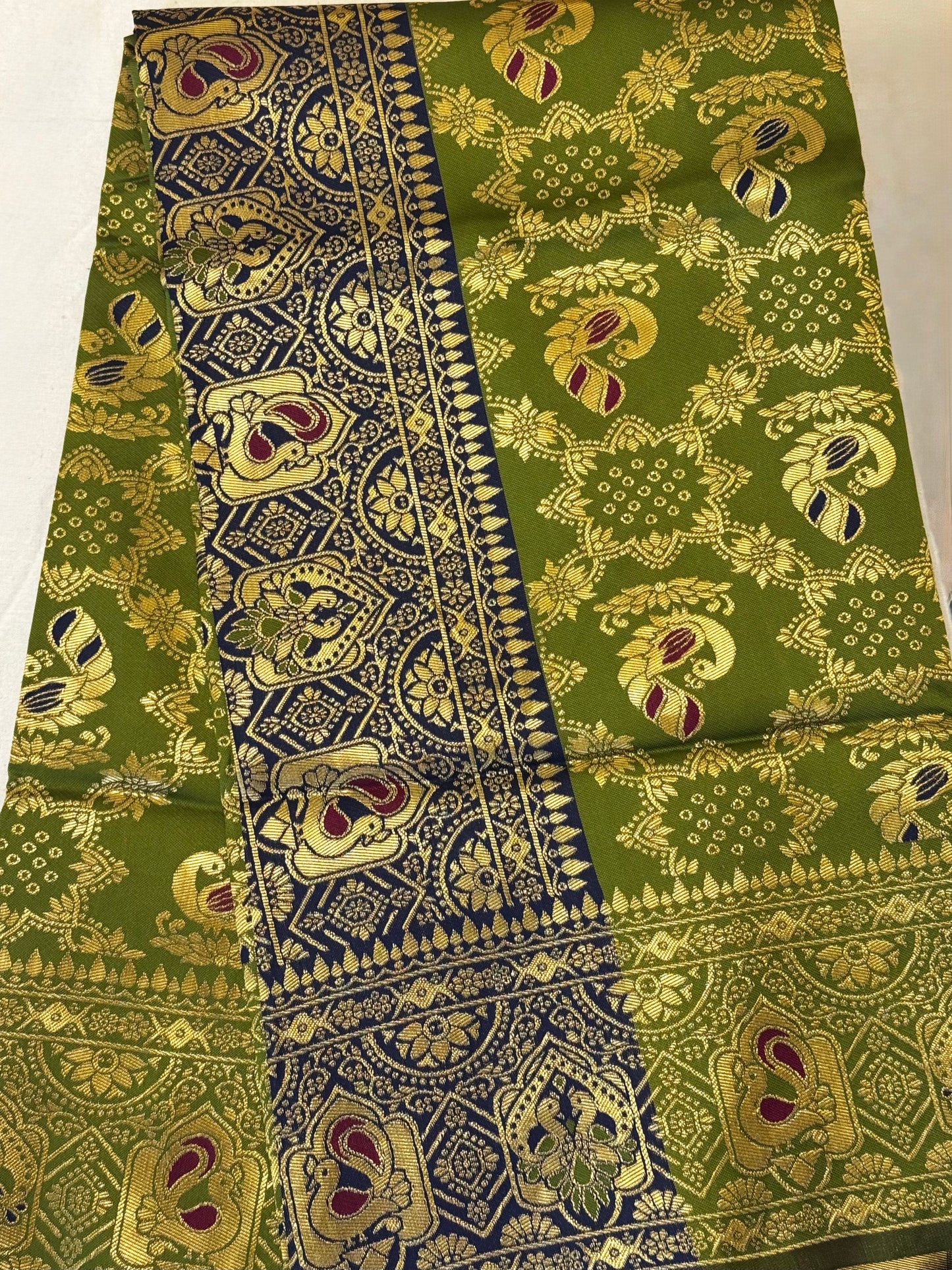 Vanya – A Handwoven Olive Green Patola Saree with Navy Contrast and Golden Zari Detailing