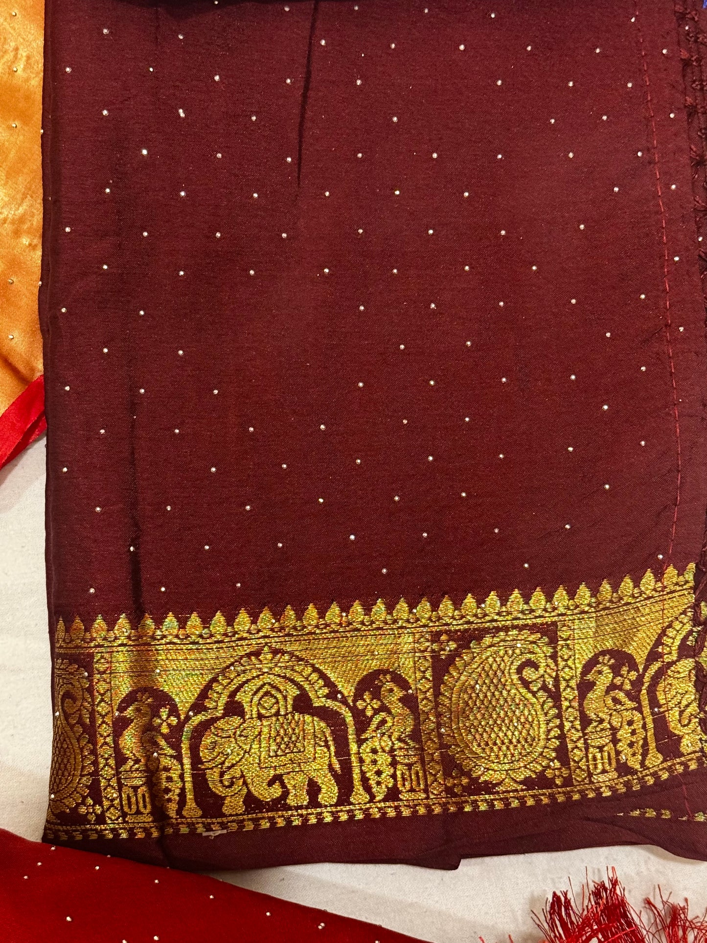 Rajlaxmi – Dola Silk Sarees with Zari Borders and Swarovski Detailing