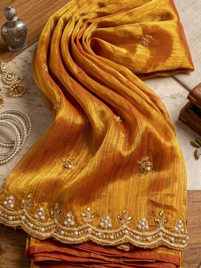 Mrinalini – A Tissue Silk Saree with Pearl and Zari Embroidery