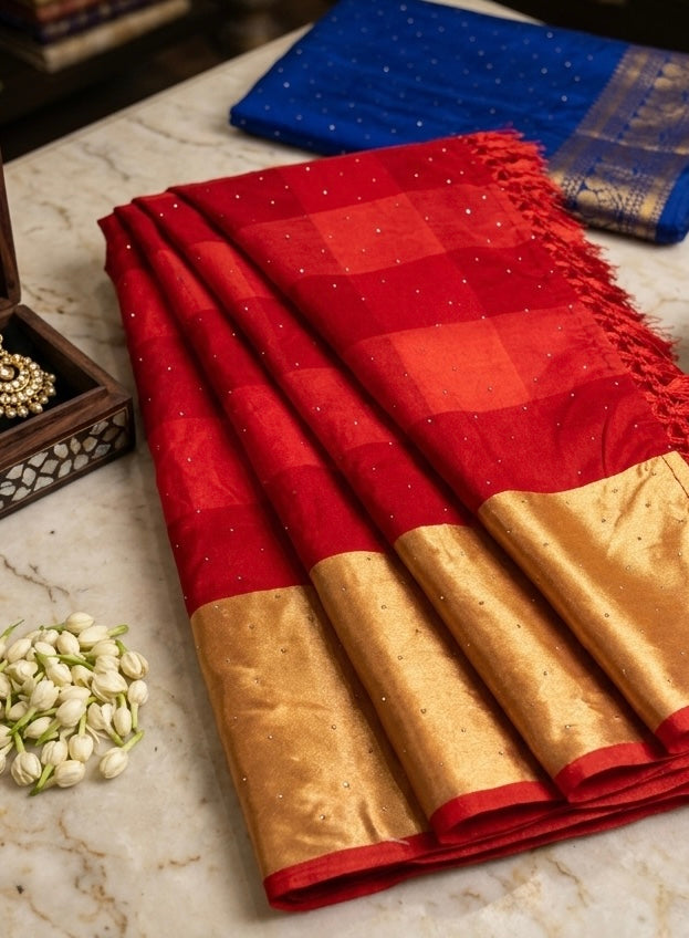 Rajlaxmi – Dola Silk Sarees with Zari Borders and Swarovski Detailing