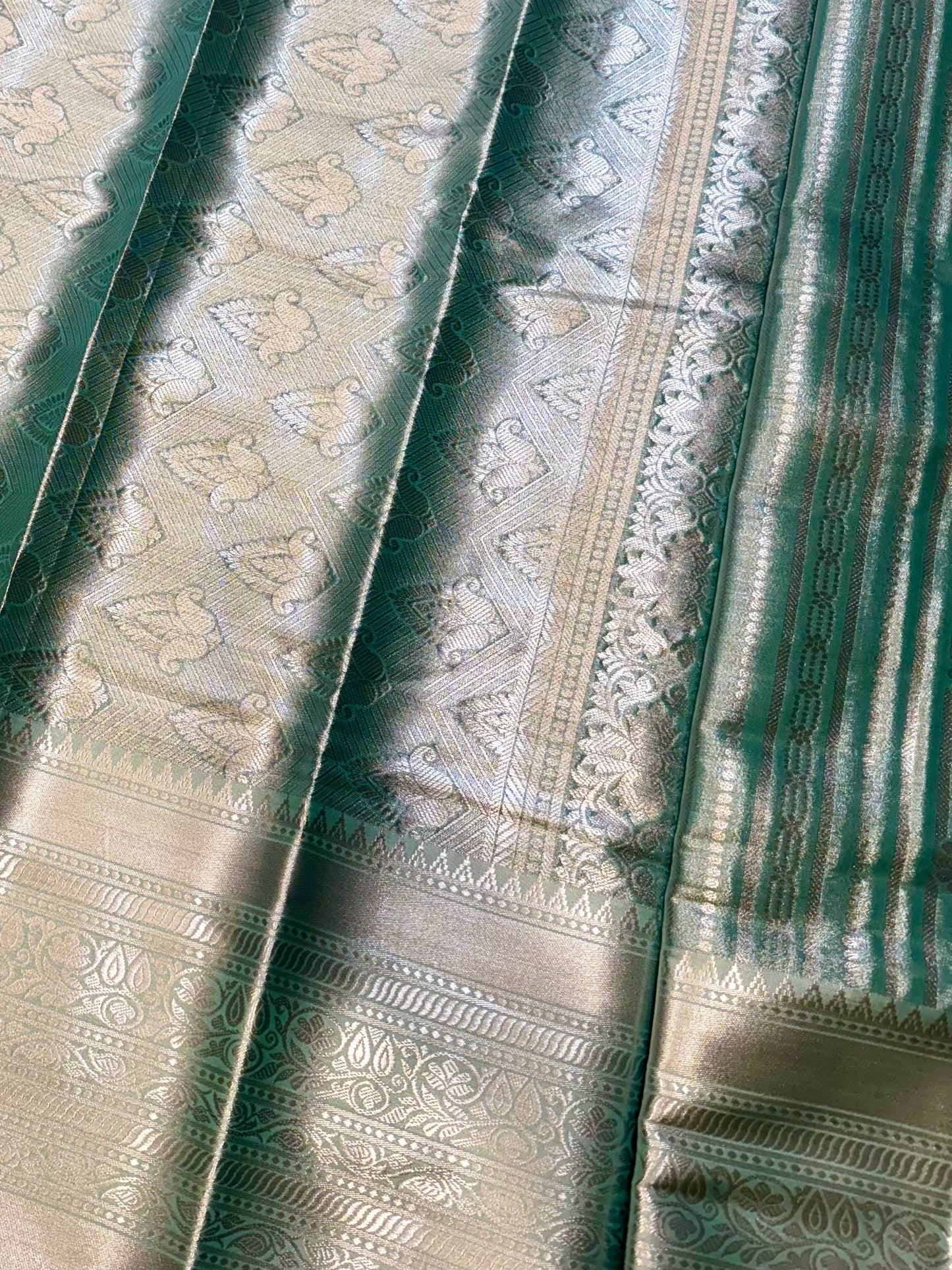 Varnika – Mint Silver Self-Woven Kanjeevaram Silk Saree with Traditional Motifs