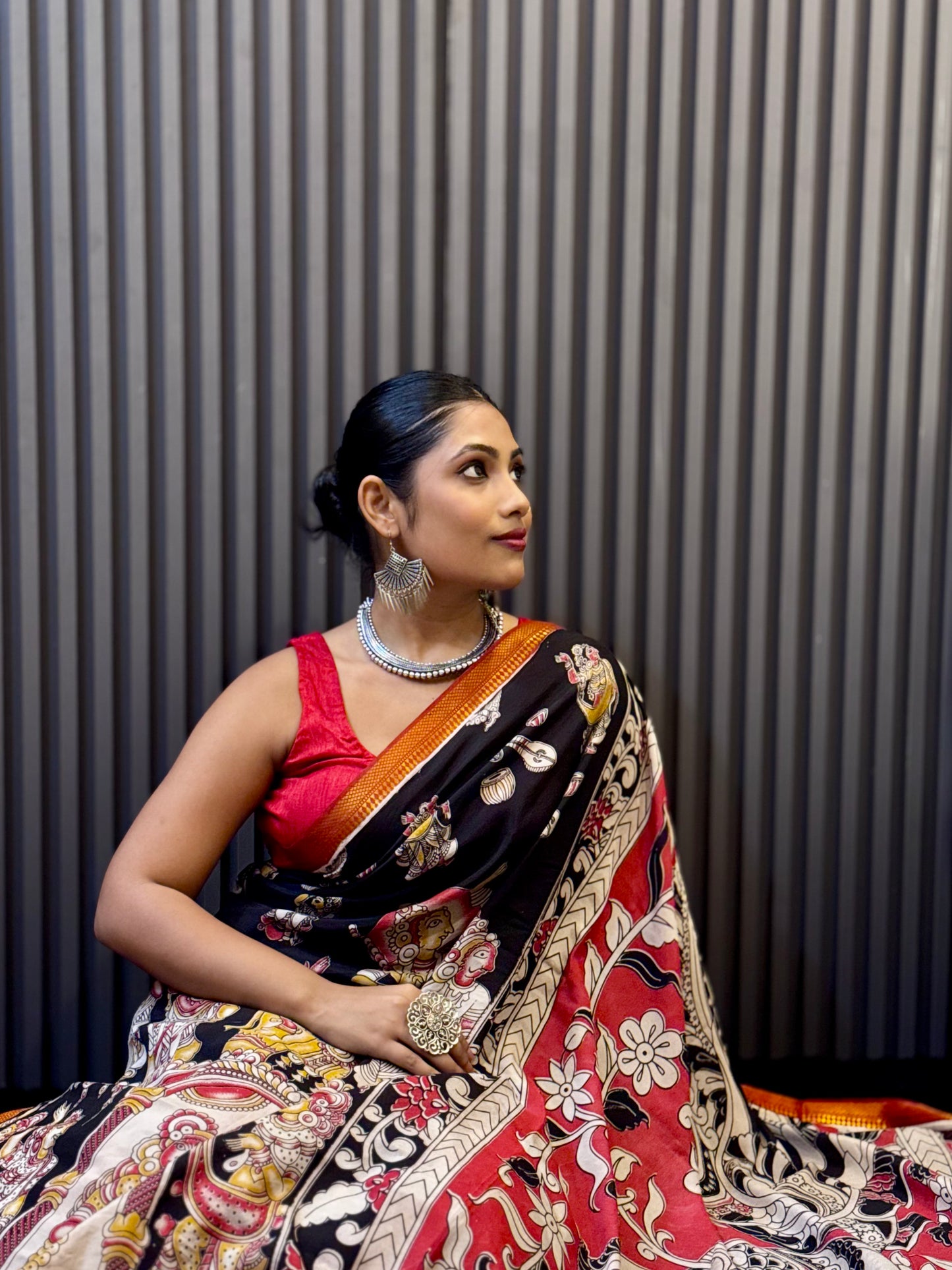 Kalika - Black Kalamkari silk saree with Deity & Peacock Motifs