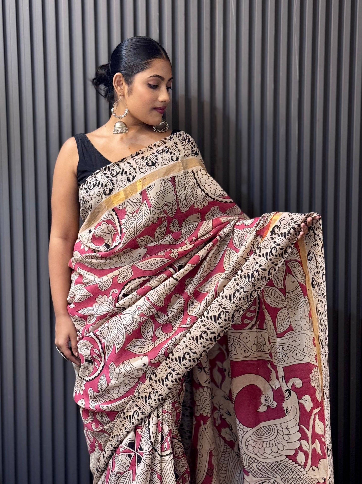 Mayurkatha - Soft Pink Kalamkari silk saree with Peacock & Fish Motifs