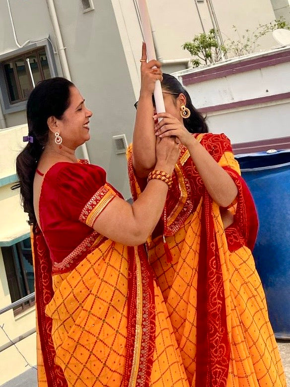 Surya Rekha – Mustard Red Silk Saree with Bandhani-Inspired Grid & Zari Border