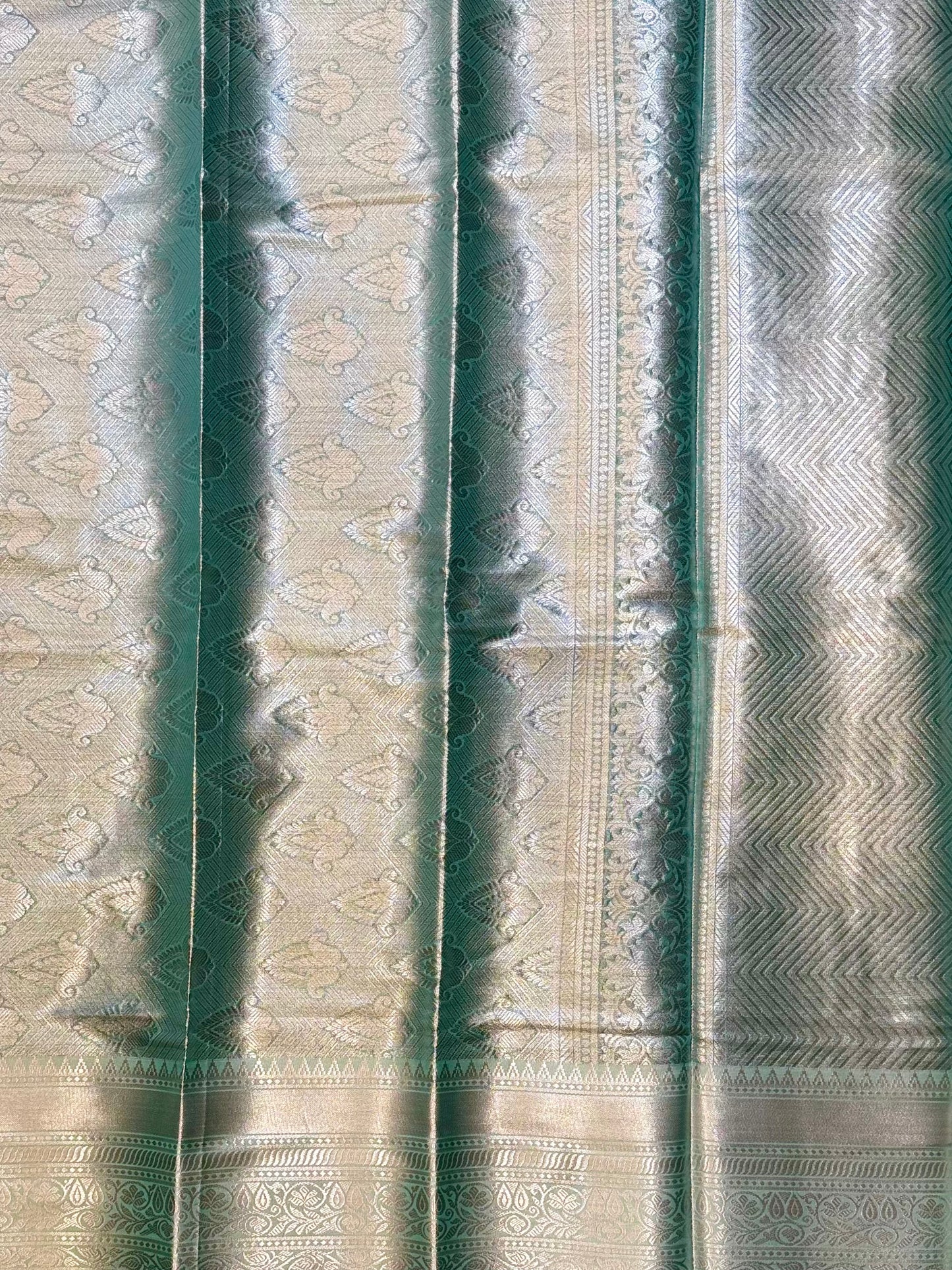 Varnika – Mint Silver Self-Woven Kanjeevaram Silk Saree with Traditional Motifs