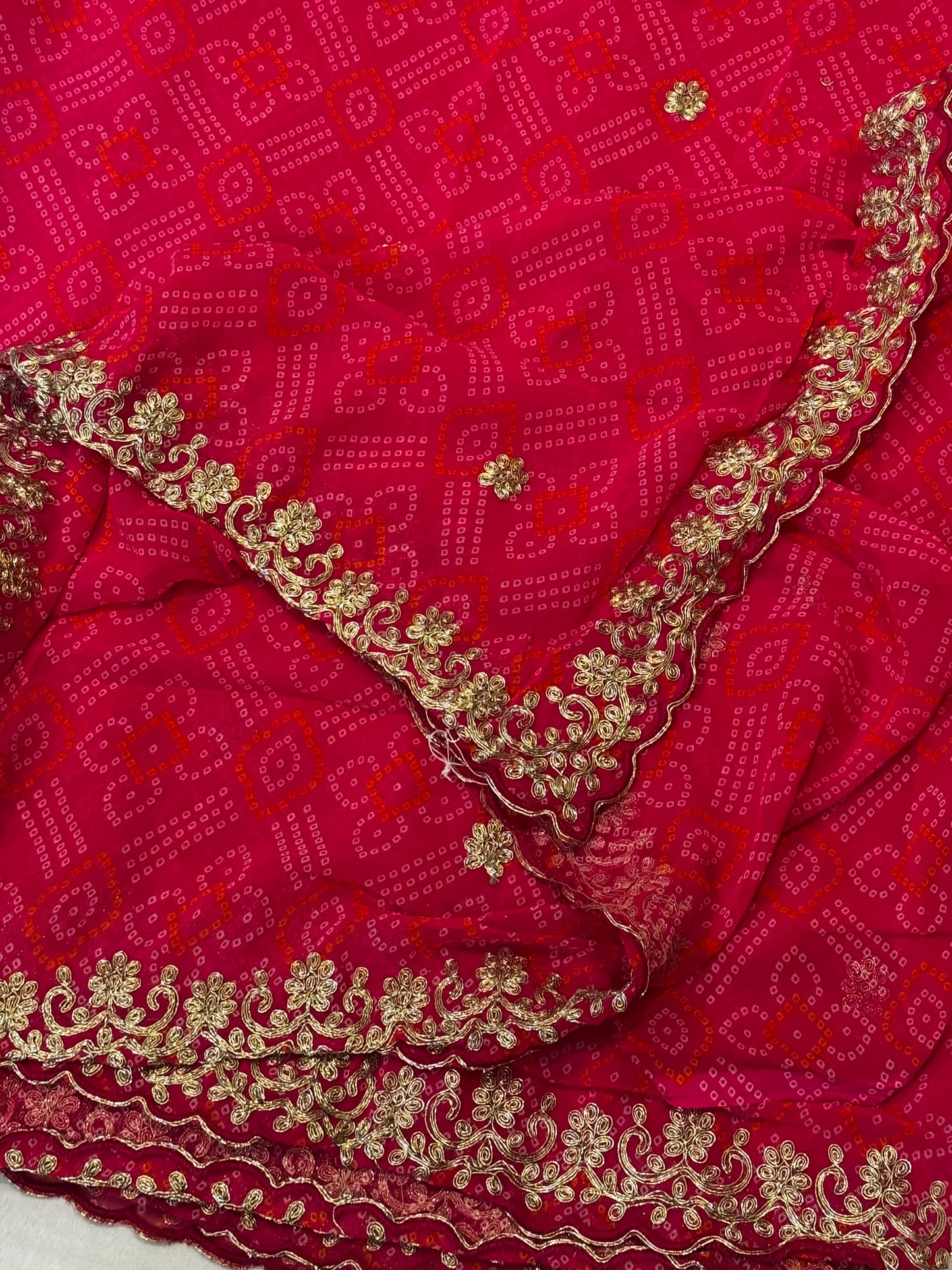 Ruhani – A Deep Pink Bandhani Saree with Gota Lace Border