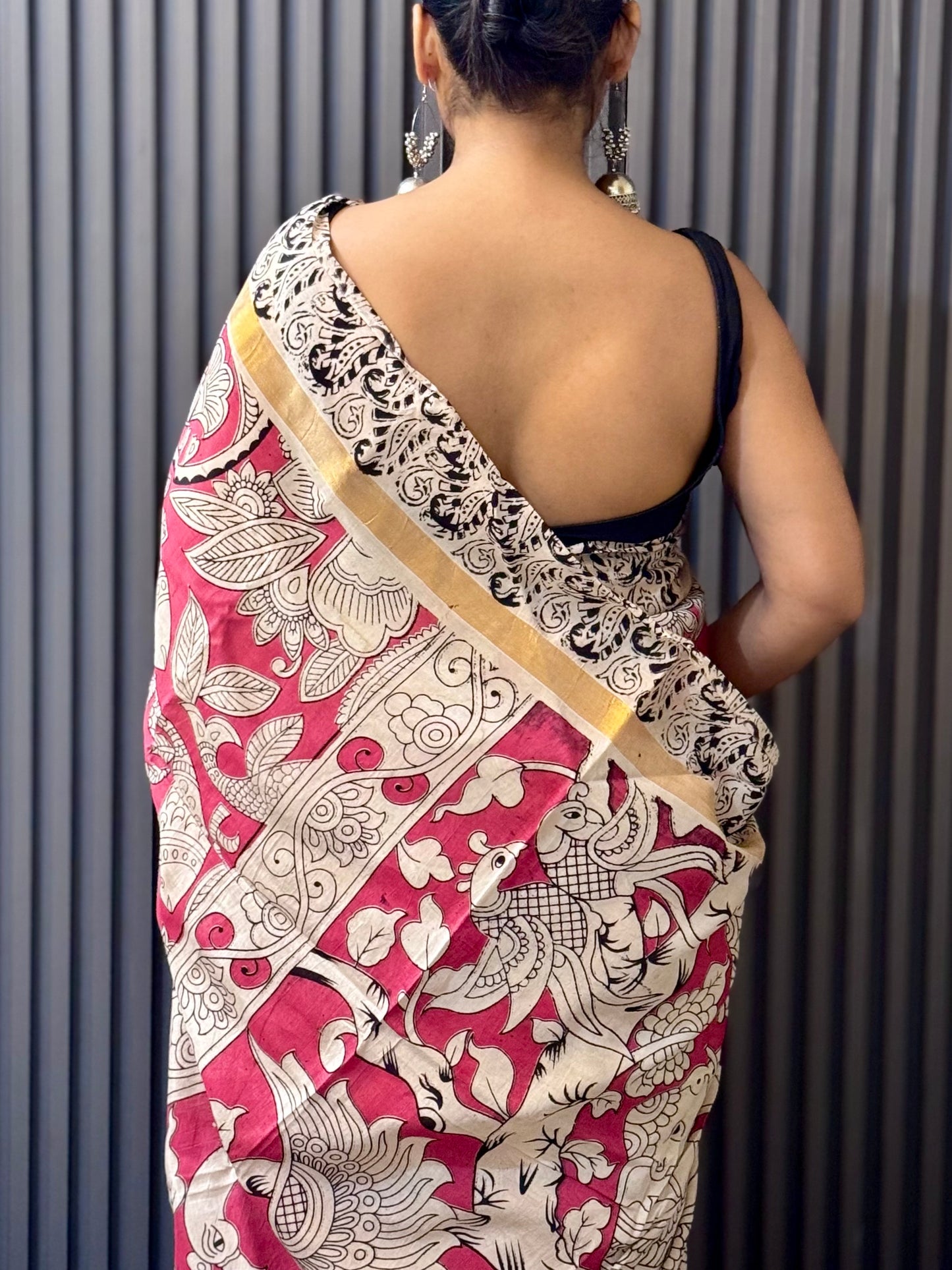 Mayurkatha - Soft Pink Kalamkari silk saree with Peacock & Fish Motifs