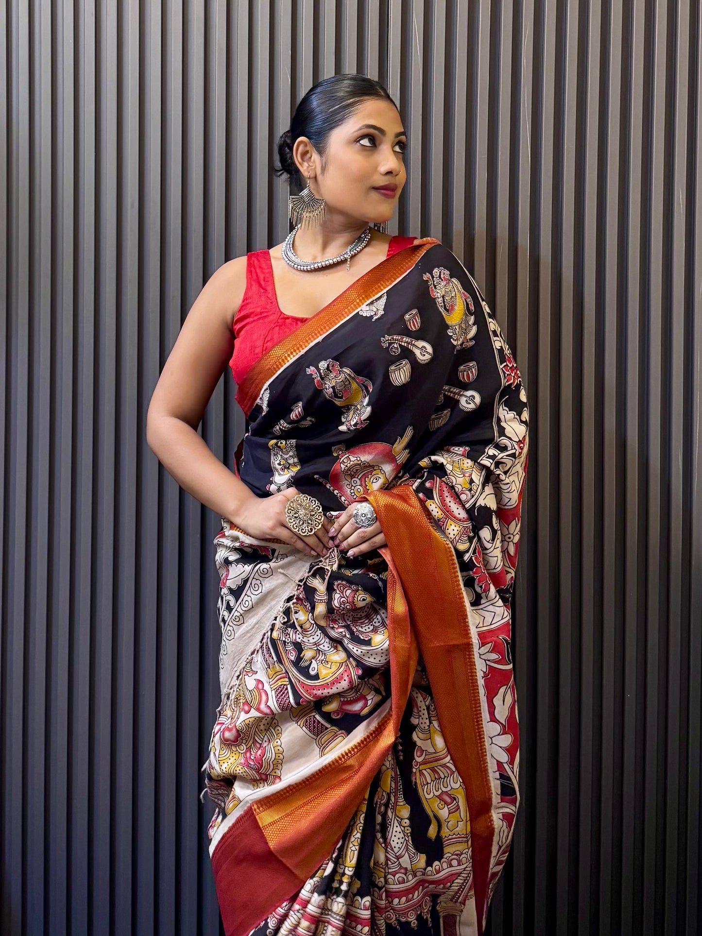 Kalika - Black Kalamkari silk saree with Deity & Peacock Motifs