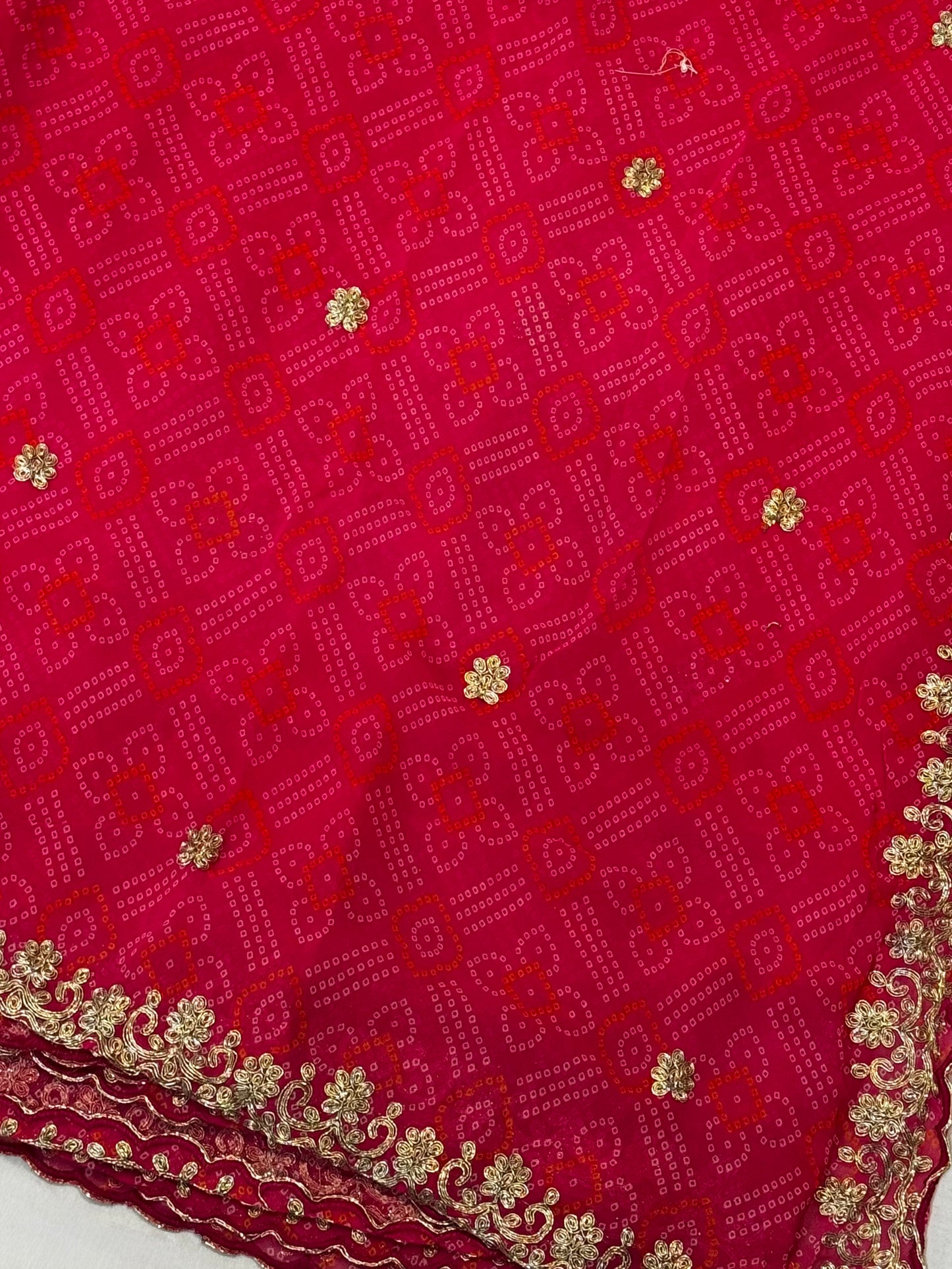 Ruhani – A Deep Pink Bandhani Saree with Gota Lace Border